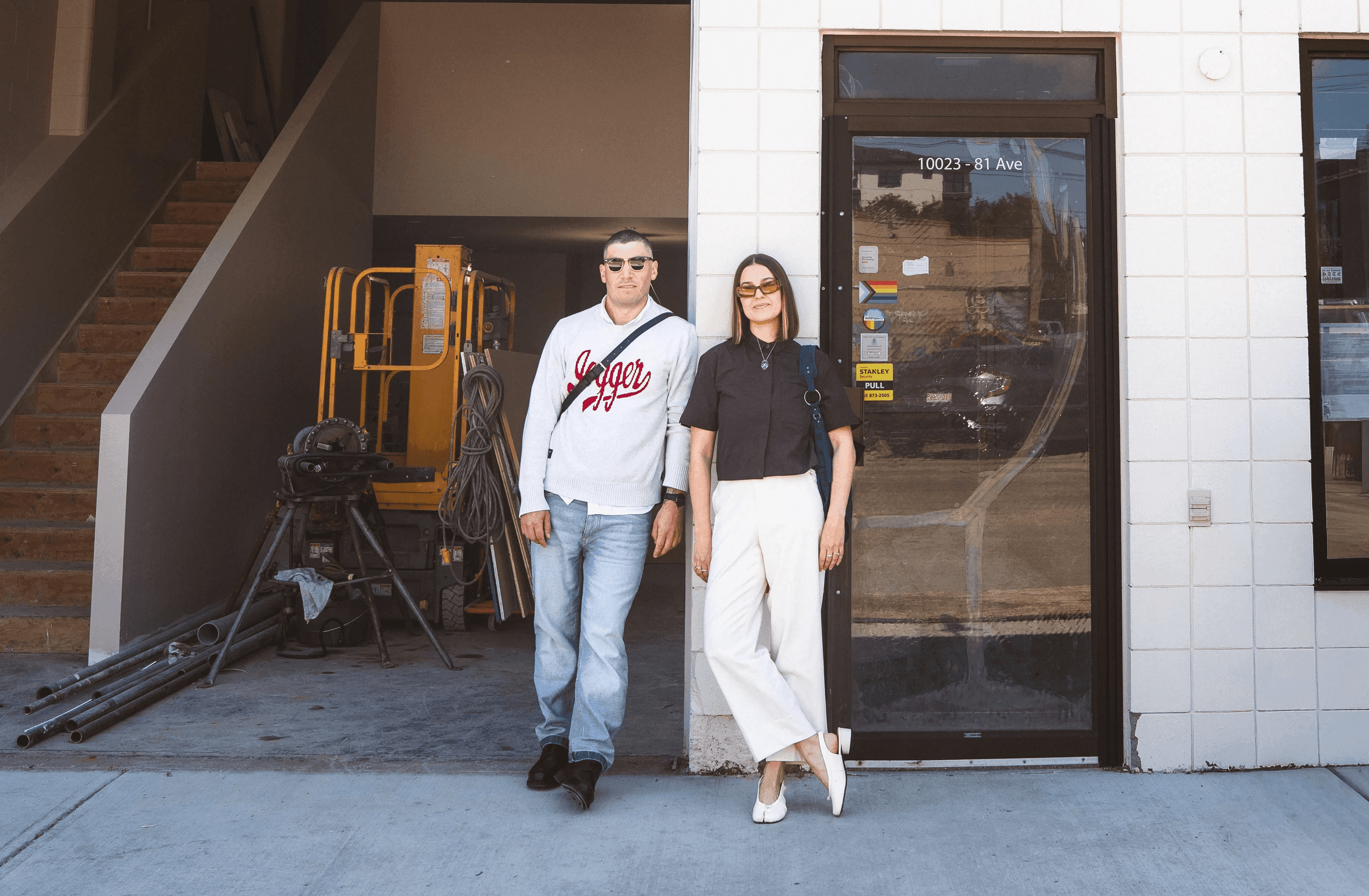 The Good Enough Studio team standing outside the studio on 81 Ave in Edmonton